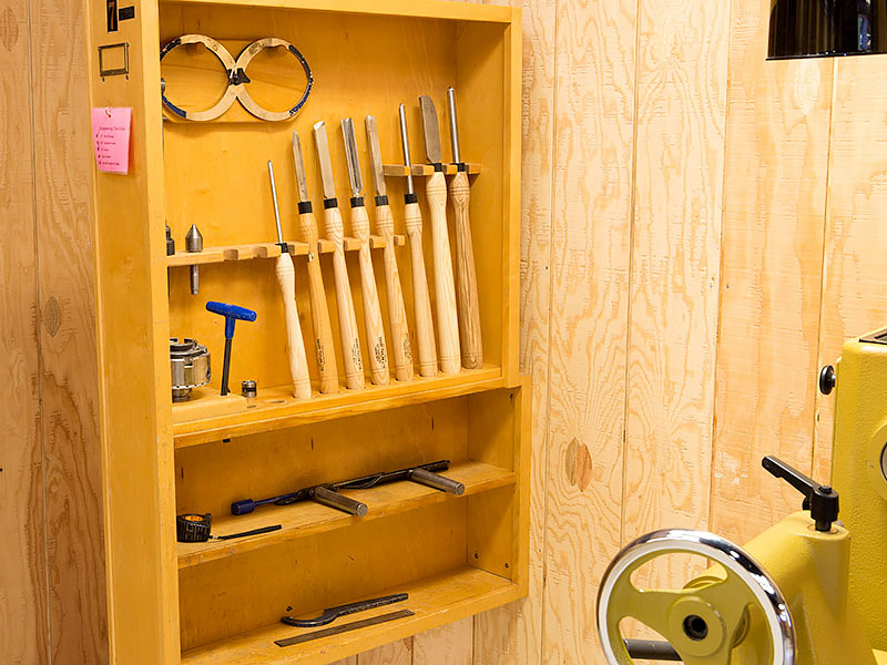 A workstation tool panel filled with tools.