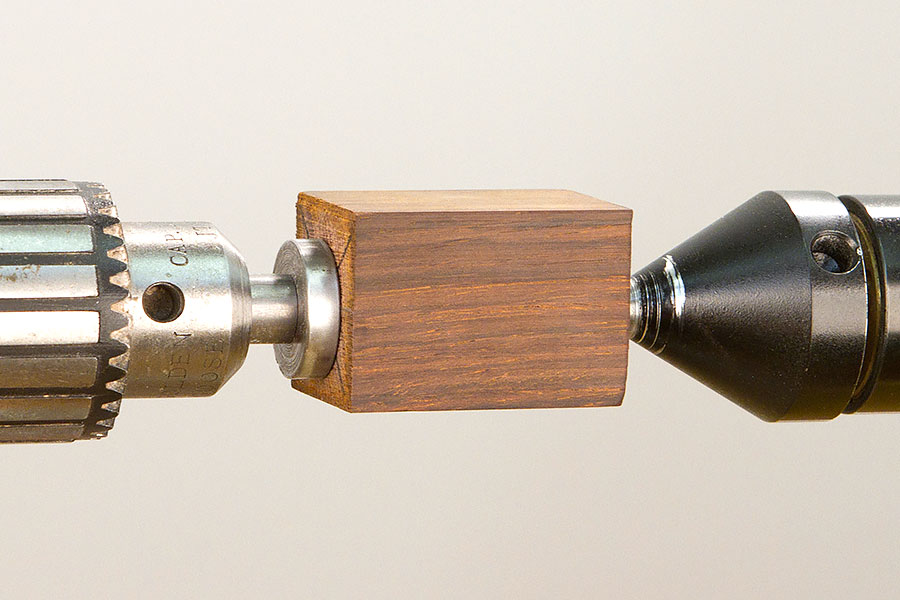 The blank mounted on a mandrel with tailstock support.