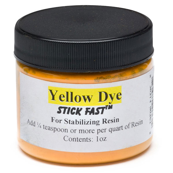 A jar of yellow stabilizing dye.