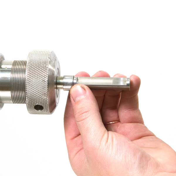 Mounting the closed end mandrel in a collet chuck.