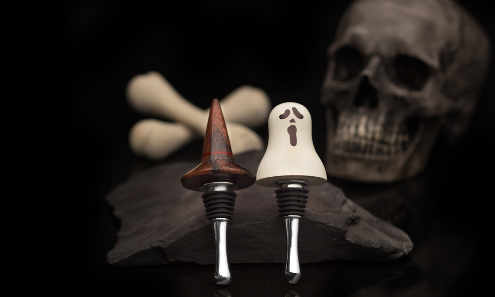 The finished witches hat and ghost bottle stoppers.