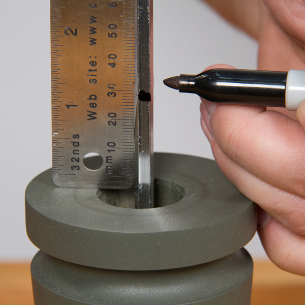 Measuring and marking the mill rod.
