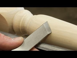 Turning a baluster with a skew chisel.