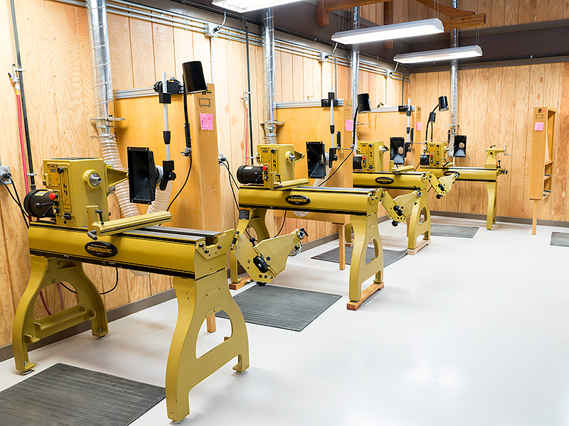 A row of student lathes and workstations.