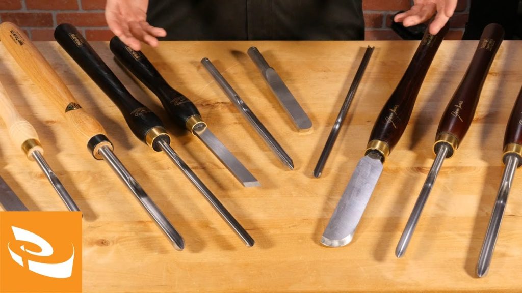 A selection of turning tools laid on a table.