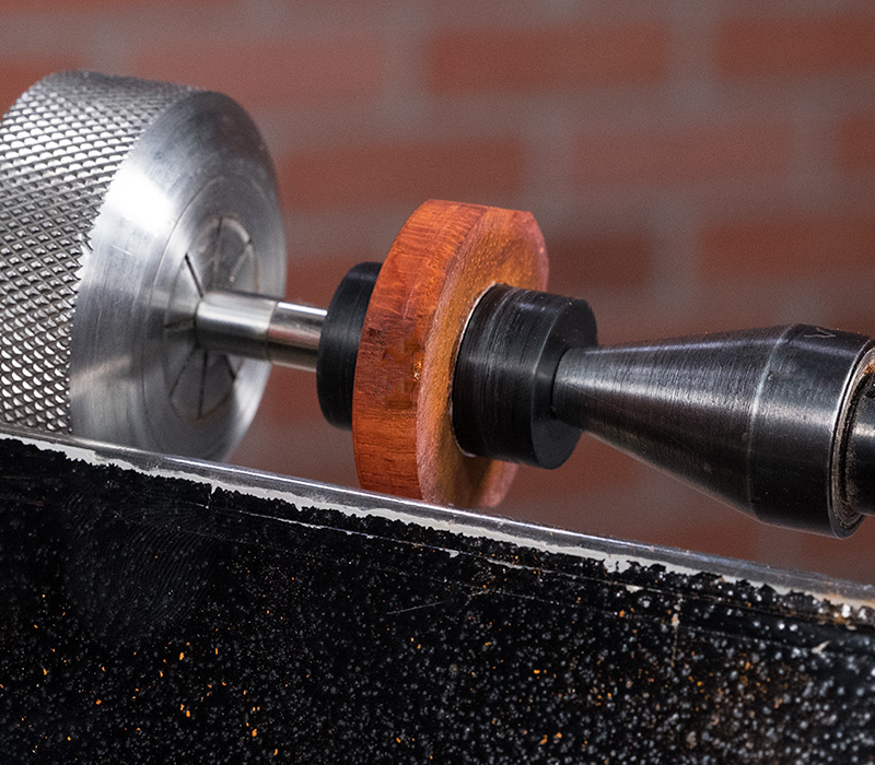 The ring blank mounted on a mandrel.
