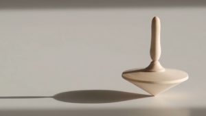 A spinning top on a table.