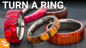 A group of turned rings on a table.