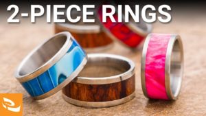 A group of 2 piece rings on a table.