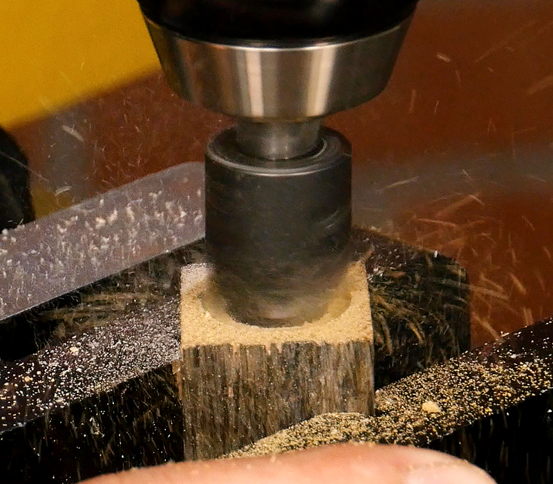 Trimming the end of the brass tube.