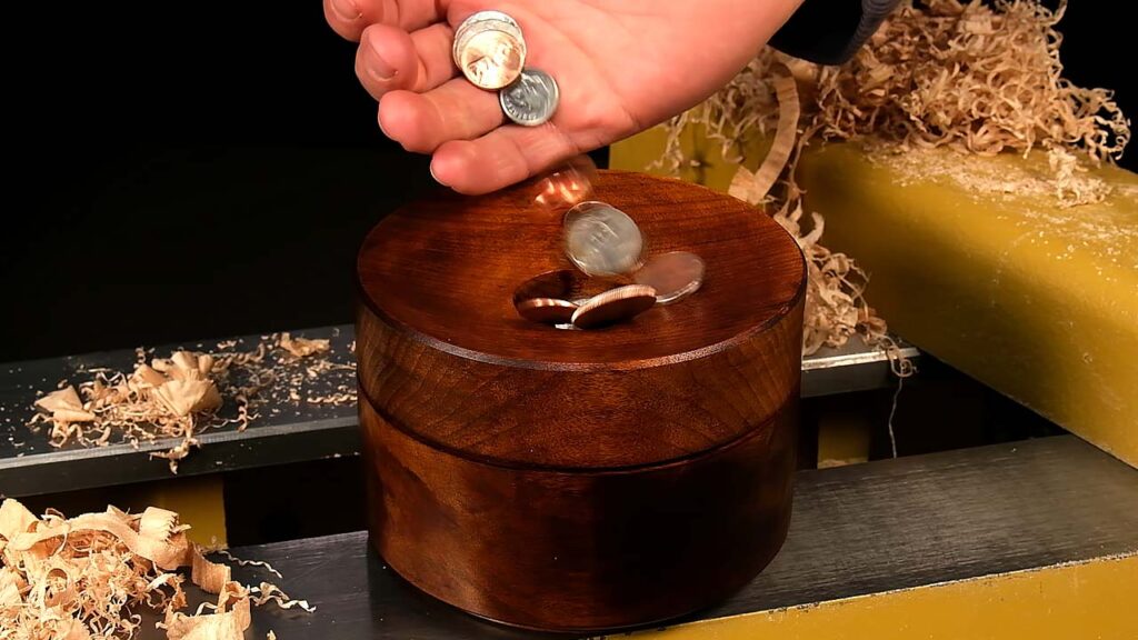 Turning a coin box
